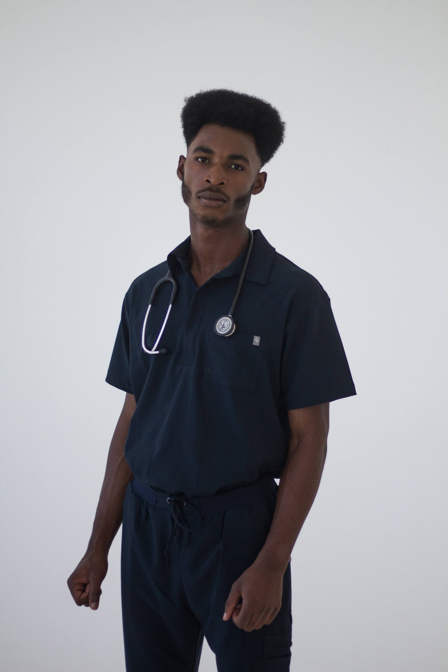 The Newton Golfer Scrub Top
